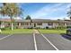 Quaint ranch home with red accents and a stone facade at 217 N Hill Ave # 20, Deland, FL 32724