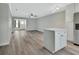 Modern kitchen with white cabinets and stainless steel appliances at 217 N Hill Ave # 20, Deland, FL 32724
