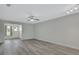 Spacious living room featuring hardwood floors and neutral walls at 217 N Hill Ave # 20, Deland, FL 32724
