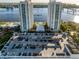 Aerial view of condo complex with parking and waterfront access at 241 Riverside Dr # 2205, Holly Hill, FL 32117