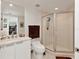 Clean bathroom with a walk-in shower and white vanity at 241 Riverside Dr # 2205, Holly Hill, FL 32117