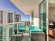 Relaxing balcony with outdoor furniture and city views at 241 Riverside Dr # 2205, Holly Hill, FL 32117