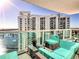 Relaxing furnished balcony with cityscape and water views at 241 Riverside Dr # 2205, Holly Hill, FL 32117