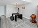 Modern dining area with a black table and globe bar at 241 Riverside Dr # 2205, Holly Hill, FL 32117