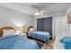 Cozy bedroom with two twin beds, suitable for guests at 2700 Ocean Shore Blvd # 111, Ormond Beach, FL 32176