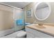 Bathroom with shower/tub, vanity, and updated fixtures at 2700 Ocean Shore Blvd # 111, Ormond Beach, FL 32176