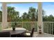 Private balcony with outdoor seating and scenic views at 4672 Riverwalk Village Ct # 8201, Ponce Inlet, FL 32127