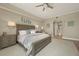 King bedroom with private bathroom access and neutral decor at 4672 Riverwalk Village Ct # 8201, Ponce Inlet, FL 32127