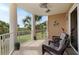 Private balcony with patio furniture and scenic views at 4672 Riverwalk Village Ct # 8201, Ponce Inlet, FL 32127