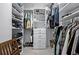 Large walk-in closet with ample shelving and hanging space at 4672 Riverwalk Village Ct # 8201, Ponce Inlet, FL 32127