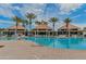 Community pool with multiple cabanas and seating areas at 4672 Riverwalk Village Ct # 8201, Ponce Inlet, FL 32127