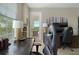 Bright home office with a large window, desk, and hardwood floors at 4672 Riverwalk Village Ct # 8201, Ponce Inlet, FL 32127