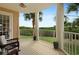 Spacious balcony offering relaxing seating and nature views at 4672 Riverwalk Village Ct # 8201, Ponce Inlet, FL 32127