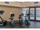Community fitness center with stationary bikes and other cardio equipment at 4672 Riverwalk Village Ct # 8201, Ponce Inlet, FL 32127