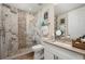Modern bathroom with a large walk-in shower and updated vanity at 4672 Riverwalk Village Ct # 8201, Ponce Inlet, FL 32127