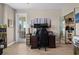 Home office with built-in shelving, desk, and hardwood floors at 4672 Riverwalk Village Ct # 8201, Ponce Inlet, FL 32127