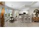 Modern kitchen with white cabinets, granite counters, and stainless steel appliances at 4672 Riverwalk Village Ct # 8201, Ponce Inlet, FL 32127