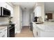 Modern kitchen with stainless steel appliances and granite countertops at 4672 Riverwalk Village Ct # 8201, Ponce Inlet, FL 32127