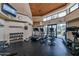 Well-equipped gym with treadmills, elliptical machines, and weights at 4672 Riverwalk Village Ct # 8201, Ponce Inlet, FL 32127