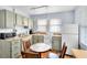Small, well-equipped kitchen with granite countertops at 4111 S Atlantic Ave, Port Orange, FL 32127