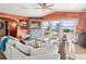 Bright and airy living room with ocean views and comfortable seating at 3580 Ocean Shore Blvd, Ormond Beach, FL 32176