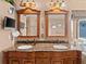 Bathroom with double vanity and granite countertop at 3580 Ocean Shore Blvd, Ormond Beach, FL 32176
