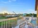 Enjoy sunset views from this deck overlooking the backyard and neighborhood at 3580 Ocean Shore Blvd, Ormond Beach, FL 32176