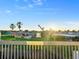 Relaxing deck with sunset views over the neighborhood at 3580 Ocean Shore Blvd, Ormond Beach, FL 32176