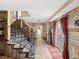 Another view of the curved staircase and entryway at 3580 Ocean Shore Blvd, Ormond Beach, FL 32176