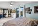 Spacious bedroom with large closet and private balcony access at 3580 Ocean Shore Blvd, Ormond Beach, FL 32176
