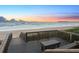 Elevated deck overlooking the ocean at sunset at 3580 Ocean Shore Blvd, Ormond Beach, FL 32176
