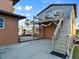 Elevated garage with stairs leading to a charming deck and ocean views at 3580 Ocean Shore Blvd, Ormond Beach, FL 32176
