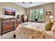 Bright bedroom with a comfortable bed and plenty of storage at 605 Champions Gate, Deland, FL 32724