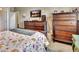 Spacious bedroom with large dresser and TV at 605 Champions Gate, Deland, FL 32724
