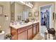 Double vanity bathroom with walk-in closet at 605 Champions Gate, Deland, FL 32724