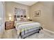 Cozy bedroom with a comfortable bed and nightstands at 605 Champions Gate, Deland, FL 32724