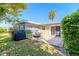 Backyard with deck, fire pit, and grill at 100 Talo Cir, Port Orange, FL 32127