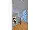 Upstairs hallway with wood floors, leading to bedrooms and bath at 3 Wisteria Dr, Ormond Beach, FL 32176