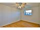 Bright bedroom with hardwood floors and a window at 3 Wisteria Dr, Ormond Beach, FL 32176