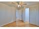 Bright bedroom with hardwood floors and a closet at 3 Wisteria Dr, Ormond Beach, FL 32176