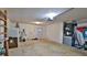 Large garage offering shelving and extra space for storage at 3 Wisteria Dr, Ormond Beach, FL 32176