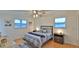 Charming bedroom with hardwood floors and plenty of natural light at 3 Wisteria Dr, Ormond Beach, FL 32176