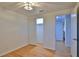 Well-lit bedroom with hardwood floors and a spacious closet at 3 Wisteria Dr, Ormond Beach, FL 32176