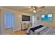 Comfortable bedroom with large window and built-in wardrobe at 3 Wisteria Dr, Ormond Beach, FL 32176