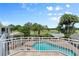 Enjoy the pool and golf course view from this expansive balcony at 1978 Country Club Dr, Port Orange, FL 32128