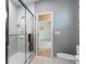 Clean bathroom with a walk-in shower and updated fixtures at 1978 Country Club Dr, Port Orange, FL 32128