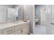 Updated bathroom features a vanity with vessel sink and a large shower at 1978 Country Club Dr, Port Orange, FL 32128