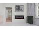 Relaxing bathroom with fireplace, marble wall, and mirrored closet at 1978 Country Club Dr, Port Orange, FL 32128