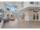 Open living space with high ceilings and wood flooring at 1978 Country Club Dr, Port Orange, FL 32128