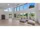 Bright living room with high ceilings and large windows at 1978 Country Club Dr, Port Orange, FL 32128